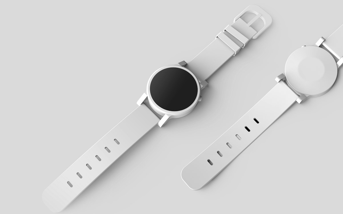 A white watch photographed on a light background.