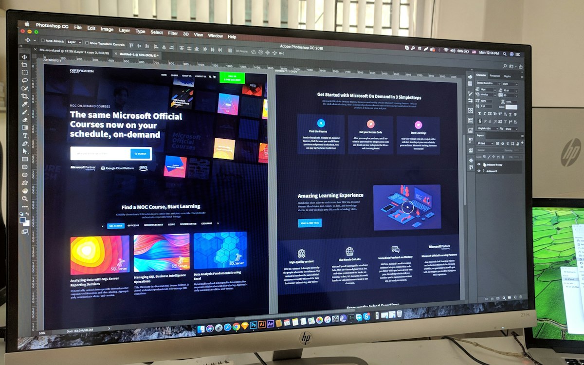 A desktop monitor showing a website design in progress.